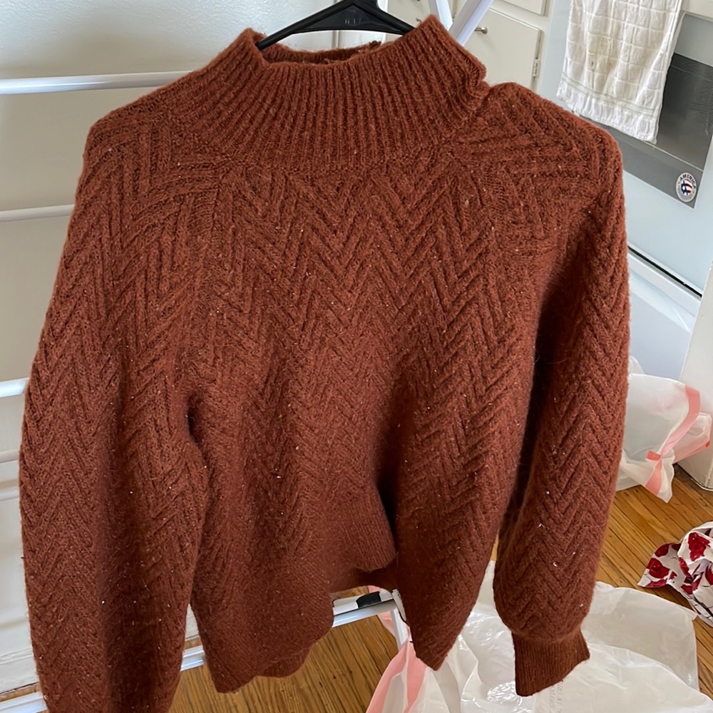 Orange sweater with puffy sleeves
